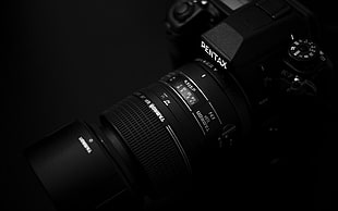closeup photo of black Pentax DSLR camera